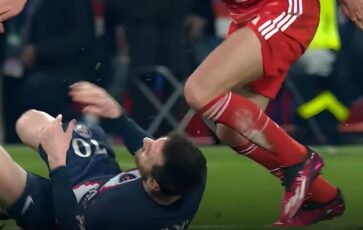 Messi au sol après le tacle d'un joueur du Bayern Munich