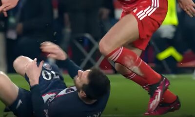 Messi au sol après le tacle d'un joueur du Bayern Munich